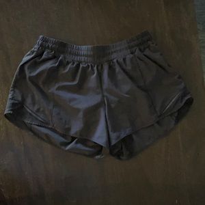Lululemon black running shorts with liner in either a size 10 or 12